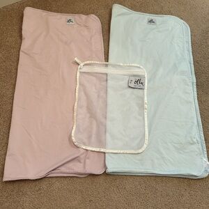 Two Ollie Swaddles and a laundry bag